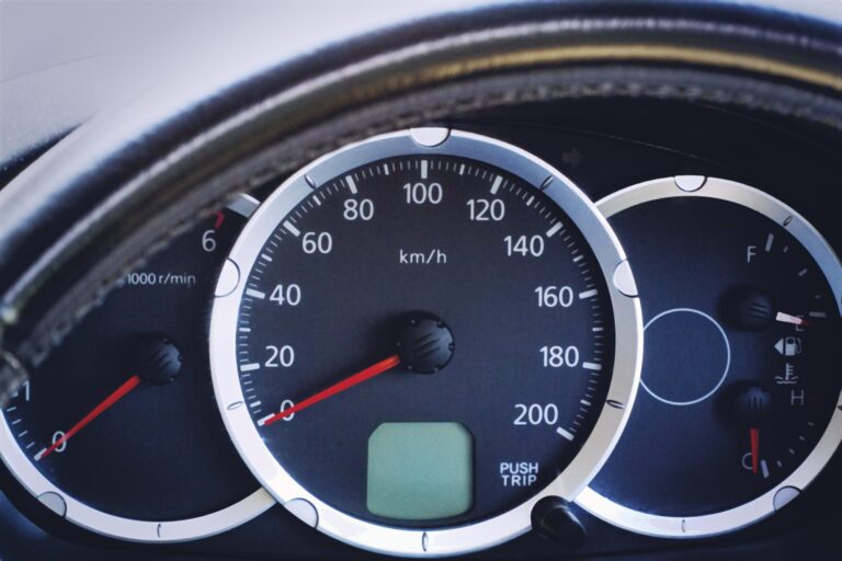 Close-up Car Console with Metric Unit System Speedometer